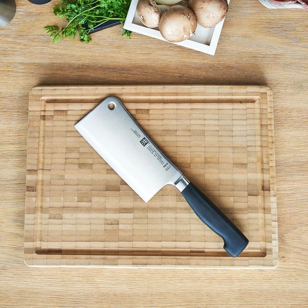 Dao chặt Zwilling Four Star Vier Sterne