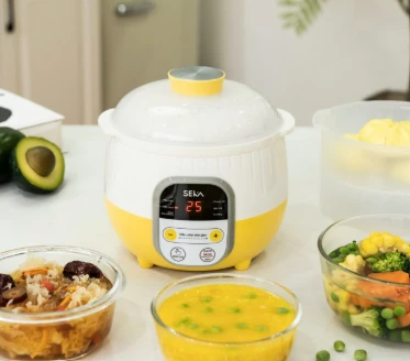 Nồi nấu cháo chậm Seka SK6132 màu vàng (kèm lồng hấp)